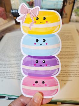 Add a touch of sweetness to your reading routine with this adorable pastel macaron bookmark! Featuring a colourful tower of four happy, smiling macarons topped with a delicate dusty pink bow, this charming accessory is perfect for book lovers, stationery fans, or as a cosy gift.