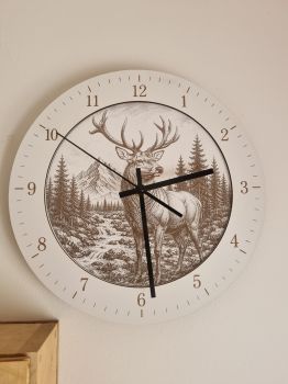 Wooden Stag Wall Clock &ndash; 30 cm
Bring the beauty of the outdoors into your home with this handcrafted wooden wall clock, featuring a stunning laser-engraved stag surrounded by a peaceful mountain and forest landscape. Combining timeless design with quality craftsmanship, this clock is a beautiful statement piece for any interior.
Made from two layers of 3 mm premium plywood, each clock is precision laser cut and engraved to create exceptional detail and a unique finish. Perfect for modern, rustic, or country-style homes.
Features
Diameter: 30 cm (12")
Material: Two layers of 3 mm premium plywood
Precision laser engraving and laser cutting
Silent quartz clock movement
Lightweight and easy to hang
Handmade in our workshop
A perfect gift for wildlife, hunting, and nature enthusiasts
Every clock is individually crafted, making each piece unique with its own natural wood character.