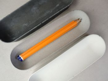Bring simplicity and style to your workspace with this minimalistic concrete desk organiser. Designed with clean lines and a smooth contemporary finish, it provides an elegant home for pens, pencils, markers, and everyday desk essentials.
Size 19.5 x 5.5 x 3cm
Choose from white, natural grey or charcoal colours.