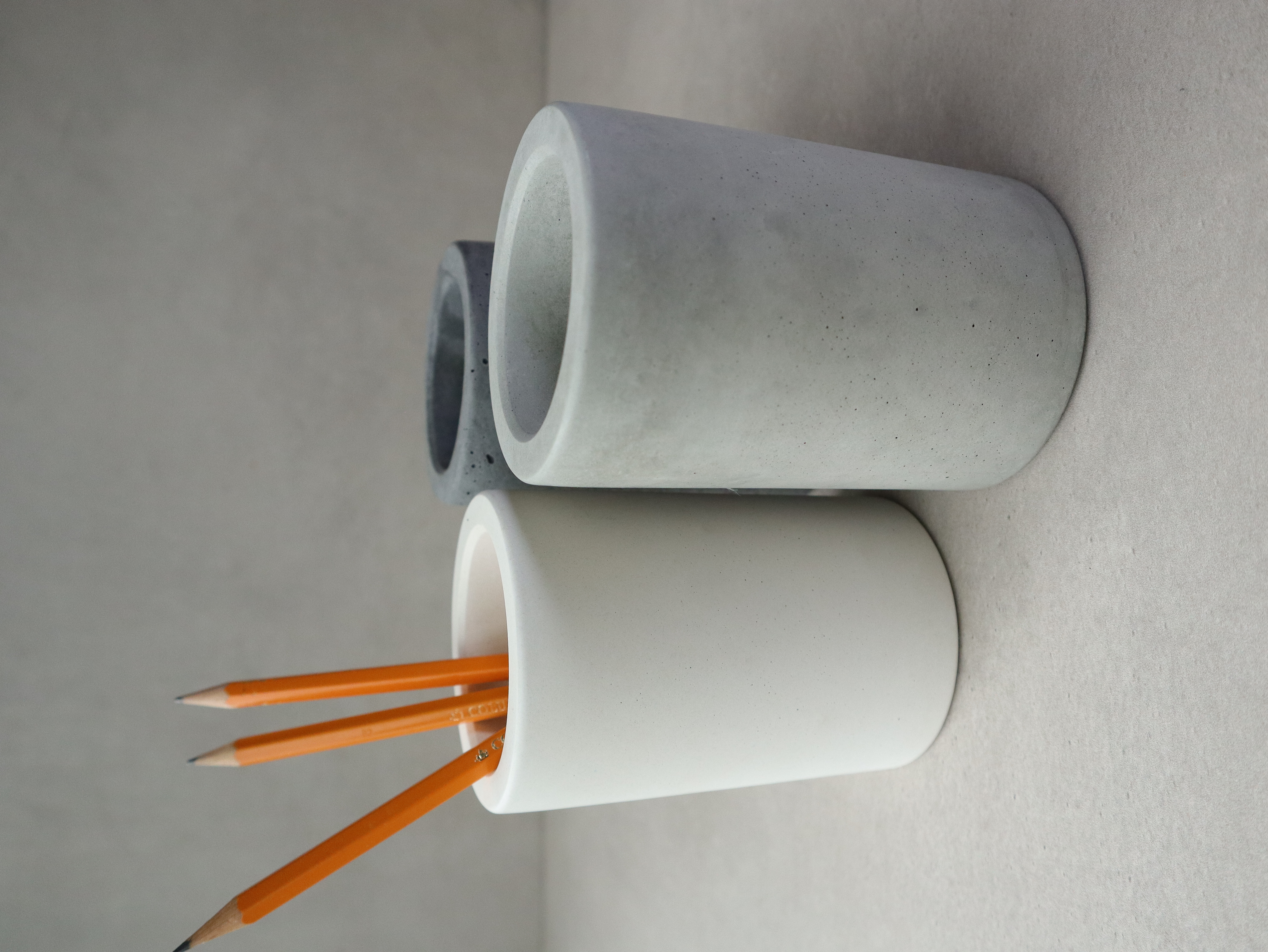 
Bring simplicity and style to your workspace with this handcrafted cylindrical concrete desk organiser. Designed with clean lines and a smooth contemporary finish, it provides an elegant home for pens, pencils, markers, and everyday desk essentials.&nbsp; Perfect for keeping your desk tidy while adding a subtle architectural touch.
Can be used on its own or with one of our concrete trays.
Size 11 x 7.5cm
