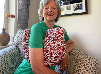 My breast cancer surgery support pillows are ideal for use directly after surgery, or in the following weeks while healing takes place. This support pillow is shaped to fit comfortably under the affected arm, and is filled with high quality polyester filling to a fairly firm finish, perfect to provide adequate support and comfort. This pillow reaches mid chest in width, so it will easily cover the surgery area, and provide support&nbsp; and padding.
It measures 43cm wide X 37cm long and 10 cm in depth. This red poppies fabric is soft and breathable. All pillows come with a handmade with love by Rodgerson Handcraft label and are reversible.