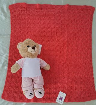 100% Cotton hand-knit blanket.