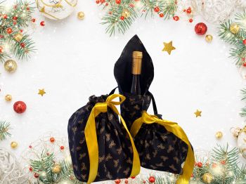 This gift bag is made using gold holly leaves on black 100% cotton Christmas fabric. This gift bag set includes 2 gift bags and 1 wine bottle holder (standard size). It is finished to a high standard and is drawstring tied with coordinating gold ribbon. It is reusable gift wrapping and will make a great tradition for wrapping Christmas presents.