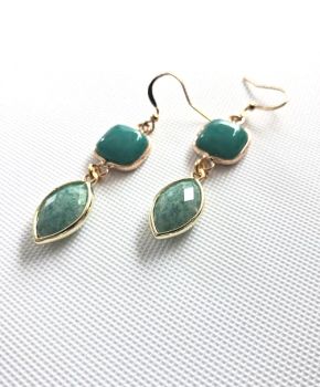 Elevate your style with these gorgeous natural gemstone earrings! Perfect for a timeless elegant look, featuring the lovely soft tones of Jade and amazonite, wrapped in sleek, polished gold tone frames.