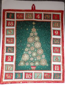 HANDMADE REUSABLE ADVENT CALENDAR.
COUNTDOWN TO CHRISTMAS DAY.&nbsp;
FILL THE POCKETS WITH TREATS, MESSAGES OR SMALL GIFTS.
USE YEAR AFTER YEAR.