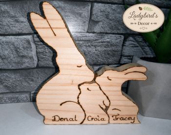 A beautiful, handcrafted wooden bunny family puzzle, custom engraved with your family names.
This 3-piece freestanding decor piece features a heartwarming design, making it the perfect heartfelt gift for Mother's Day, Father's Day, or a new baby arrival.
What makes this piece truly special is that the names are meticulously hand-burned (pyrography) onto the wood, giving each bunny an authentic, textured artisan finish.
⚠️ SAFETY NOTICE: This product is designed as a home decor item only. It is NOT a toy and is NOT suitable for children to play with.
⚠️ HOW TO ORDER: In the personalisation box below, please list the 3 names in order from largest to smallest bunny (e.g., from oldest to youngest family member).
Example 1 (2 Adults + 1 Child - As shown in photo): 1. Largest: Donal 2. Middle: Tracey 3. Smallest: Croia
Example 2 (1 Adult + 2 Children): 1. Largest: Mom (Sarah) 2. Middle: Older Child (Thomas) 3. Smallest: Younger Child (Anna)