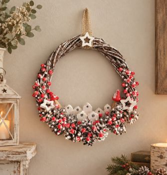 Hand-woven wreath using natural vine, decorated with handcrafted wooden houses, wooden mushroom, natural pinecones and artificial berries. Measuring approx. 35/35 cm is perfect for any interior or door, or as a unique gift.