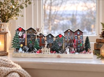 Handcrafted winter village, made entirely by hand, measuring approx. 45/7/17 cm, is perfect for any rustic interior or as a cute gift.