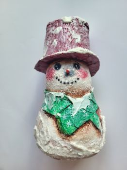 Artfully made from cotton and paper, finished with acrylic and varnish, 15 cm tall, it is perfect for any winter interior or as a cute, unique gift.