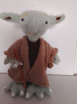 Hand knit. Made by 100% acrylic cashmere and 100% polyestor.
Dimensions 22cm in height.