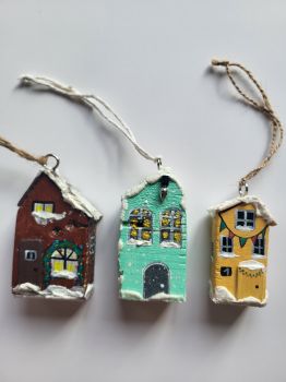 Handmade distressed wooden winter ornaments, set of 3, perfect for a Christmas tree or as a unique, rustic gift.