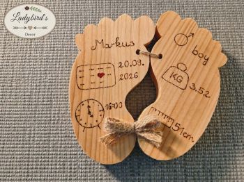 A beautiful, 100% hand-crafted and hand-burned wooden baby keepsake shaped like adorable little feet. Every single detail&mdash;the baby&rsquo;s name, birth date on a mini calendar with a red heart, birth time on a clock, weight, length, and gender&mdash;is carefully burned into the wood by hand. Connected with a charming rustic twine bow and equipped with a wall hanger on the back, this unique, completely machine-free piece is ready to hang and makes a deeply personal gift. &nbsp;We accept both Metric and Imperial measurements (kg/cm or lbs/oz/inches) to suit standard formats worldwide!
🚚 FREE Shipping across Ireland!&nbsp;(International shipping calculated at checkout)
⚠️ SAFETY NOTICE:Please note: This product is intended for decorative purposes only. It is NOT a toy. Keep out of reach of babies and young children.

&nbsp;