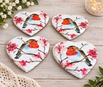 🌿 Handmade Real Stone Coasters &ndash; Robin Collection 🐦❤️ Beautiful real stone coasters, individually hand-painted and decorated with decoupage, featuring charming robin and botanical designs. ✨ Each piece is unique and handmade with care 🌿 Natural real stone with a rustic, textured finish 🎨 Hand-painted and hand-decorated using decoupage 🐦 Beautiful robin designs &ndash; perfect for autumn, winter and Christmas d&eacute;cor 🎁 A lovely handmade gift or a special addition to your home Available as individual coasters or sets.
Size 10/10cm
Heat resistant finished 
&nbsp; &nbsp;