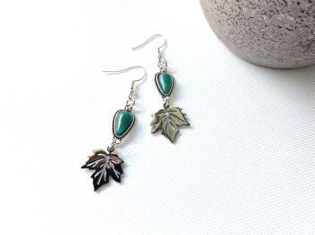 Embrace nature with these elegant, handmade drop earrings. Designed to capture a vintage look with a modern twist, these earrings are the perfect statement piece for any occasion or a thoughtful gift for someone special.