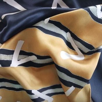
Silk Gifts Ireland Collection of scarves are the finest quality 100% pure silk, luxuriously soft and shimmery with a beautiful drape. The original designs are inspired by the rugged and magnificent landscape of the Wild Atlantic Way. 
Irish silk scarf &ldquo;Flight&rdquo; is inspired by flights of wild birds sweeping over golden cornfields and hedgerows in the Irish landscape. 
The colour palette is of rich golden hues with grey and black detail, contrasted with a beautiful deep ink blue/black of the night sky. This design will add a dramatic touch to enhance any outfit
Beautiful Gift Box with ribbon: Each scarf comes hand-packaged in a lovely gift box with a ribbon, sent with love from my Dublin studio.
100% Pure Silk:&nbsp; All the scarves in my Silk Gifts Ireland Collection are a generous 180 x 40 cm size and made from the finest 100% pure Mulberry silk with a hand-rolled hem.&nbsp;
&nbsp;They brighten up any outfit and are a must-have statement piece.
