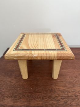 A tiny handcrafted pedestal/stand to enhance the beauty of your artefacts.