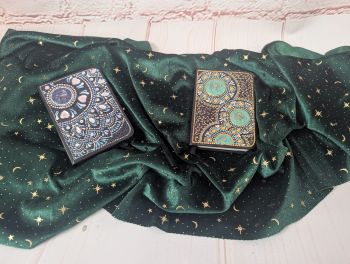 Small 10.5 &times; 7 cm lined, undated notebooks with hand-painted decorative covers, available in two designs.