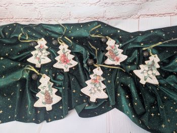 Handmade clay Christmas tree ornament, approx. 10 cm long, decorated with decoupage, gold details and a small bell. Design supplied at random.