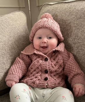 Handknit baby Aran Jacket &amp; Hat sets. If in stock shipping is 1-3 business days. If on back order shipping is 7- 14 business days from date of ordering. The Woolly Drawer