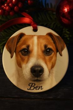 Personalised with your photo on both sides. Made from thick acrylic with a hanging ribbon and sent in a red velvet feel bag with year stamp.