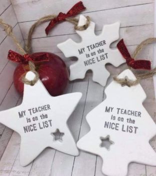 …These are made with air drying clay and are approximately 8cm, they come on jute string with a piece of red tartan ribbon. They are made to order so please allow up to 2 weeks processing. These are not suitable for outdoor use and should be kept away from water and extreme temperatures. 3 styles to choose from.