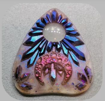 Inverted Crescent Moon with Crystal Crown &ndash; Galactic Celestial Lune Quartz &ndash; Unique Large Tear Shaped Device Spirit Pointer &ndash; Ready or CustoMade &ndash; made with resin and mica powders Available as: &ndash; Ready to go &ndash; Custom made 🌟 Allow for some slight color difference. 👻 All planchettes come with the glass cabochon 🌟 Silk cord will be color matching with the charm.