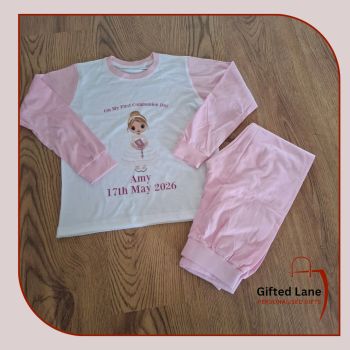 Personalised First Holy Communion Pyjamas is a personalised gift and a keepsake of a special day. They are available in pink or blue with pink and white or blue and white striped trousers and jumper sleeves, and can be&nbsp; personalised on both sides with any picture or text on them and with a date or name on them. Another special personalised gift from Gifted Lane.&nbsp;
