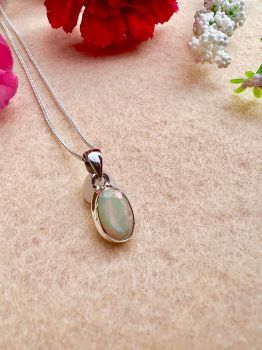Genuine Ethiopian Opal Sterling Silver Necklace.
October&rsquo;s Birthstone Necklace.
Gift Box .
This is lovely dainty piece,please check the pendant dimension.
