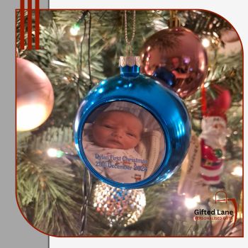 A personalised Christmas Tree Bauble / Ball is nice personalised gift and a keepsake for a new born baby First Christmas, a couple first married Christmas, a remembrance bauble to remember a loved one, to capture family memories or just a keepsake gift. Baubles are available in 10 different colours. A nice personalised gift from Gifted Lane which can be printed with any picture or small amount text on them and would make an ideal present for someone special this Christmas.
 