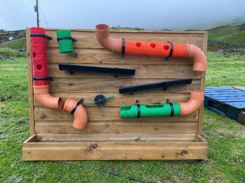 Looking for something a little different to water play? Our ball run has three tunnels, peep holes to watch the balls run. Finished in natural oil as standard or finished in your choice of colour. Approx dimensions W1.6m x H1.2m.
This product comes fully assembled. Colour of pipe varies according to availability&nbsp;