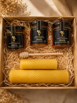 A very special Donagh Bees gift set which is beautifully presented and bursting full of Inishowen honey, beeswax candle and bee products.This gorgeous honey gift box is a treat for kids and honey lovers and includes a great collection of the best of Donagh Honeys and bee products.It makes a great gift for any special occasions.The hand crafted candle will be a beautiful addition to your dining table.The products are presented on a bed of wood wool in cardboard gift box.
The gift box includes:
1 x 227g Donagh Wildflower Honey
1x 227g Donagh Heather Honey
1 x 227g Donagh Spring Honey
1 x Wooden Dipper
2 x Hand rolled beeswax tall and short dinner candles