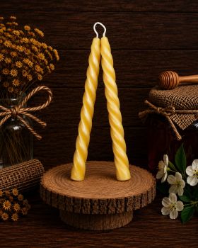 The Twisted Beeswax Candle Pair is a set of two beautiful and unique candles made from 100% pure and natural beeswax produced by Donagh bees. The twisted design adds a touch of elegance to any setting, while the natural honey scent provides a warm and inviting atmosphere. The candles burn cleanly and evenly, providing a cozy and ambient light. One of the benefits of using beeswax candles is that they are naturally hypoallergenic, making them suitable for people with allergies or sensitivities to fragrances and other additives found in other types of candles.
&nbsp;