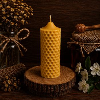 The Beeswax Honeycomb Cylinder Candle is a stunning piece that adds both beauty and a warm, natural fragrance to any room. Made from pure beeswax, this candle provides a clean, long-lasting burn and releases negative ions that help purify the air and reduce indoor pollution. The intricate honeycomb design adds a touch of nature to your d&eacute;cor, and the cylindrical shape is both elegant and functional. Light up this Beeswax Honeycomb Cylinder Candle to enjoy the soothing scent of honey while you relax and unwind in a cozy and comfortable environment.Product Details:Dimensions:&nbsp;150mm x 55mmMaterials:&nbsp;Pure Beeswax, CottonWeight 280g
Burn time: 40 hour