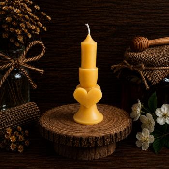 Introducing our Heart Shape Beeswax Candle, handcrafted from pure and natural beeswax. Measuring 115mm long and 40mm wide, this 50g candle has a burn time of approximately 10 hours. Its heart shape design adds a touch of romance, while its subtle honey aroma soothes and delights the senses. Clean-burning and eco-friendly, this candle is the perfect choice for anyone who cares about sustainability. Enjoy a warm and cozy atmosphere with our Heart Shape Beeswax Candle.