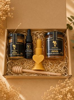 Looking for a special gift to show your love and appreciation for the important women in your life? Look no further than our Bee Well Gift Box - a wonderful way to celebrate Mother's Day or Easter!
This beautifully curated set is filled with natural goodness sourced from the amazing world of bees. Our pure, raw honey is a delicious superfood that's loaded with antioxidants, enzymes, and other health-boosting nutrients. It's perfect for adding to your favorite recipes, or simply drizzling over toast or tea.
Our beeswax candle not only creates a cozy and relaxing atmosphere, but also purifies the air naturally - making it a perfect addition to any home.
But that's not all - our Bee Well Gift Box also includes a bottle of propolis liquid. This powerful substance, produced by bees, is known for its immune-boosting and healing properties. From soothing sore throats and coughs, to promoting oral health and enhancing wound healing, propolis liquid is a natural way to support your overall wellbeing.
And for an extra boost of nutrition, we've also included a jar of bee pollen - another amazing superfood that's packed with vitamins, minerals, and antioxidants.
All of these incredible bee products come together in a thoughtfully designed gift box that's as beautiful as it is practical. So go ahead, spoil your mom, grandma, or any special woman in your life with the gift of health and wellness. Order our Bee Well Gift Box today and discover the amazing power of the hive!!