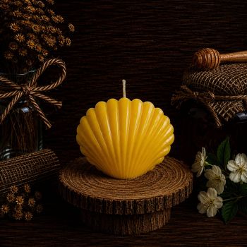 The Shell Beeswax Candle is a high-quality, all-natural candle made from pure beeswax. It is crafted in the shape of a shell and features a beautifully detailed design that makes it a great decorative piece for any home or space.
This candle is not only visually appealing but also eco-friendly, as beeswax is a renewable resource and burns cleanly, without emitting harmful toxins into the air.
With a weight of 123 grams, this candle is compact and easy to handle, measuring 70mm in length and 100mm in width. Its burn time of 20 hours ensures that you can enjoy the warm, soothing glow of its natural flame for an extended period of time.
The Shell Beeswax Candle is perfect for use in the home, office, or any space where you want to create a relaxing and calming atmosphere. It also makes for an excellent gift for loved ones who appreciate natural and sustainable products.