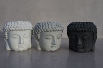 Concrete pot &ndash; Buddha. Great piece to use for small plants, storing small items or simply decorating with. It will definitely add character to your interior. Each item is unique due to the shade of colour and texture that is formed by air bubbles when pouring the concrete mixture. Size: weight: 650g, height/width: 10 / 10cm. To note &ndash; no drainage hole.
