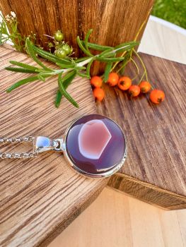 High polished Botswana Agate Sterling Silver Necklace
Metal: Sterling SilverGem: Natural Botswana AgateAgate Size: 21mm x 21mm
