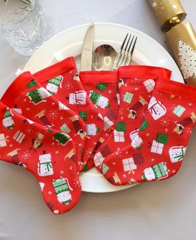 &bull;Decorate your Christmas table with these cats and dogs wearing Christmas clothes fabric stockings cutlery holder set. There are sets of 4, 6, 8, 10 and 12 stockings available topped with Christmas red ribbon, backed with red felt. Multiple sets can be ordered at checkout. &bull;Each stocking can be used to hold your dinner cutlery, candy canes, or simply hang on your Christmas tree or hang on your wall or mantlepiece as a garland.&nbsp;