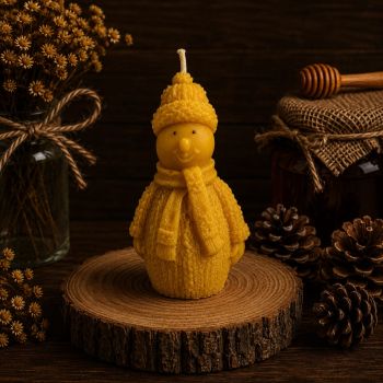 Bring winter magic indoors with our Snowman Beeswax Candle. Crafted from our own beeswax, this festive candle stands 110mm tall, 65mm wide, and weighs 72g, offering up to 16 hours of enchanting glow. Embrace the season with this whimsical and eco-friendly addition to your holiday decor.
