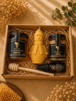 Introducing our Ultimate Honey Gift Box, a harmonious ensemble of nature&rsquo;s finest offerings. Unwrap the delight of one jar of our luscious Summer Honey, a jar of nutrient-packed Bee Pollen, and a 20ml Propolis Dropper for a boost of wellness. Complete the experience with the charm of a handcrafted Snowman Beeswax Candle. This thoughtfully curated gift box is a celebration of sweetness, health, and craftsmanship. Whether it&rsquo;s a special occasion or a gesture of appreciation, our Ultimate Honey Gift Box is the perfect way to share the pure essence of nature with those you care about.