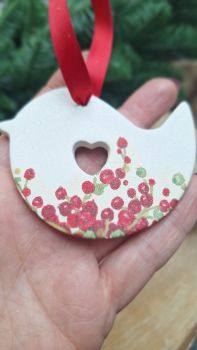Handmade clay ornament, made using air dry clay and decoupage. Measures approx 8cm and is for indoor use only. Beautiful shimmer finish and hung on jute string.
Please allow up to 2 weeks processing.
Beautiful gift and or stocking filler gift. Handmade in ireland.
I'm.happy to include a gift message if you'd like to send this directly to the recipient. Just message with your request.
