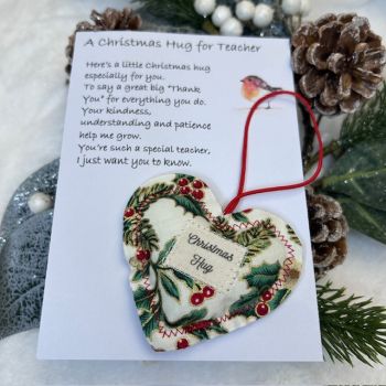 This beautiful Christmas Hug is made from 100% cotton Christmas fabric and is hand made in our little business in County Limerick, Rani Handcrafts Ireland. Each Christmas Hug comes with an appreciation poem on a card for a special teacher or SNA and is a beautiful keepsake. This is a thoughtful way to show your appreciation at Christmas for an especially supportive teacher or SNA. Just let us know in the &ldquo;Note to vendor&rdquo; space, whether this Christmas hug is for a teacher or SNA.
Please note the Christmas fabric may be different to that shown in the photo.