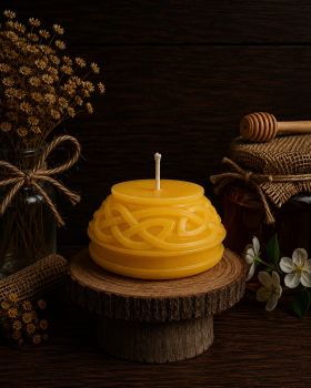Crafted with precision, this candle is a testament to the timeless allure of Celtic design and the purity of beeswax. The intricate Celtic patterns gracefully adorn the surface, adding a touch of mystique to any space.
&nbsp;
Dimensions: 60mm (width) x 30mm (length)
Weight: 65g
Burn time: Up to 6 hours