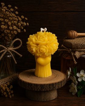 Introducing our Love Bouquet Flower Beeswax Candle &ndash; a perfect gift for weddings. With a charming floral design, measuring 110mm x 75mm and weighing 212g, this candle boasts a 25-hour burn time. Crafted from premium beeswax, it radiates a subtle honey fragrance, adding warmth to any space. Embrace the essence of love with this elegant and enduring candle.