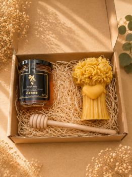 Discover the essence of love and celebration with our Wedding Gift Box, a curated selection designed to commemorate the union of two souls. Inside, you'll find the richness of our premium Raw Honey, a sweet and natural delight sourced from the finest locations. Complementing this is our Love Bouquet Flower Beeswax Candle, a symbol of love and elegance crafted with meticulous detail. This thoughtfully curated gift box is a beautiful expression of best wishes for the newlyweds as they embark on their journey together.
