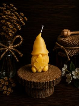 Discover the charm of our Dwarf Beeswax Candle, a petite delight measuring 95mm in length, 45mm in width, and weighing just 36g. Meticulously handcrafted from pure beeswax, it emanates a subtle honey-like fragrance, providing a warm and inviting ambiance to any space. With a burn time of 10 hours, this natural and elegant candle is perfect for adding a touch of coziness to your home.