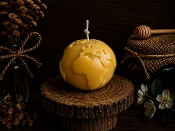 Elevate your space with the Earth Candle - a sustainable delight at 65mm x 70mm and 195g. This handcrafted beauty offers 25 hours of soothing illumination, bringing natural elegance to your surroundings. Illuminate your space responsibly with the Earth Candle.