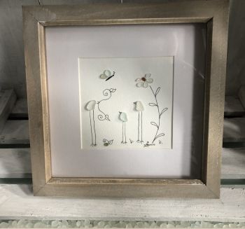 Family.&nbsp; Made from geniune tumbled seaglass collected by me and my family from Seaham beach.&nbsp; &nbsp;Wooden frame 9 inches X 9 Inches.&nbsp;