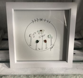 Family together time.&nbsp; Made from geniune tumbled seaglass collected by me and my family from Seaham beach.&nbsp; &nbsp;White frame 9 inches X 9 Inches.&nbsp;
